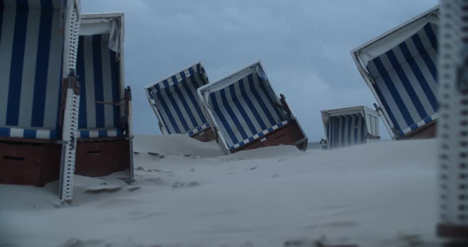 Some of the tents on the beach have turned over