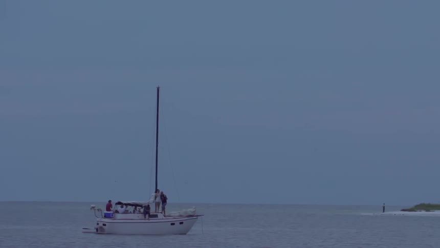 Sailboat on the water with no sail up