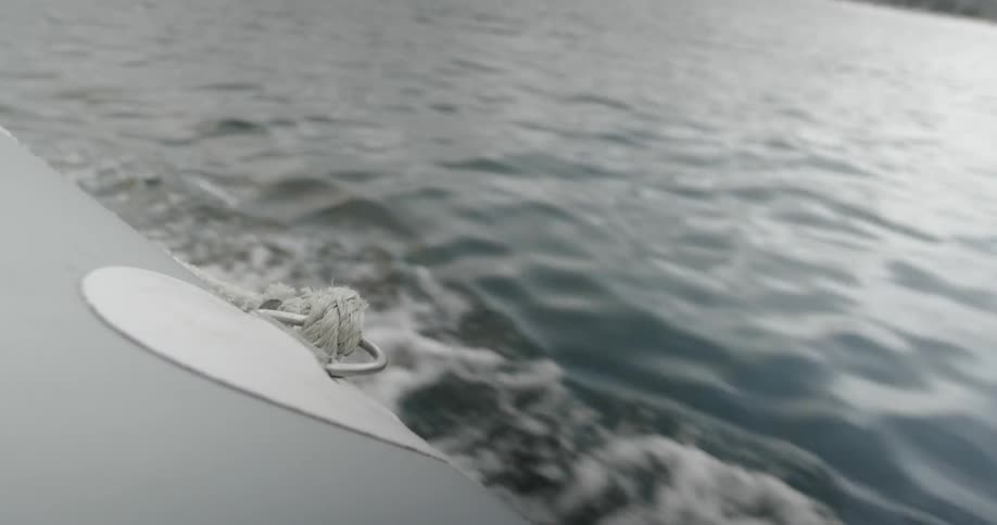 The boat is moving fast in the water
