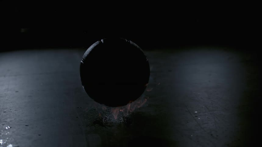Flaming basketball is bouncing
