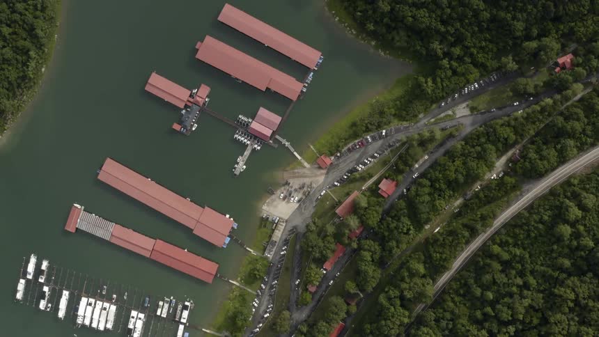 Boats float on a lake marina