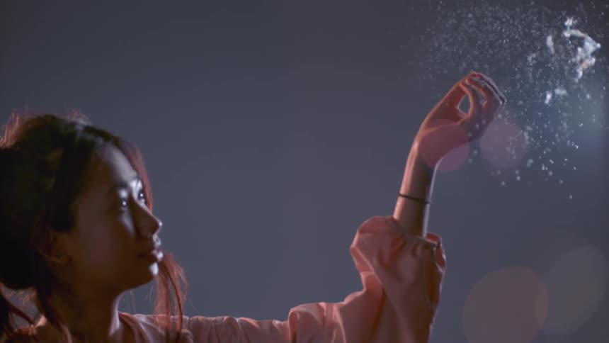 Girl Playing With Bubbles And Balloons In Studio