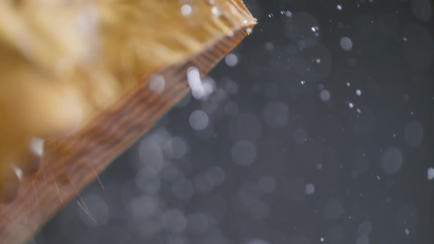 The rain powers over the yellow raincoat