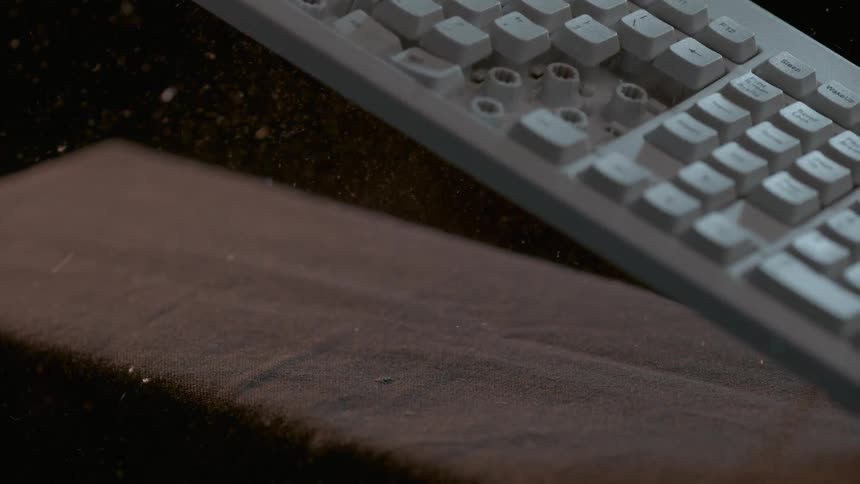 Hammer hits a keyboard and several keys become dislodged