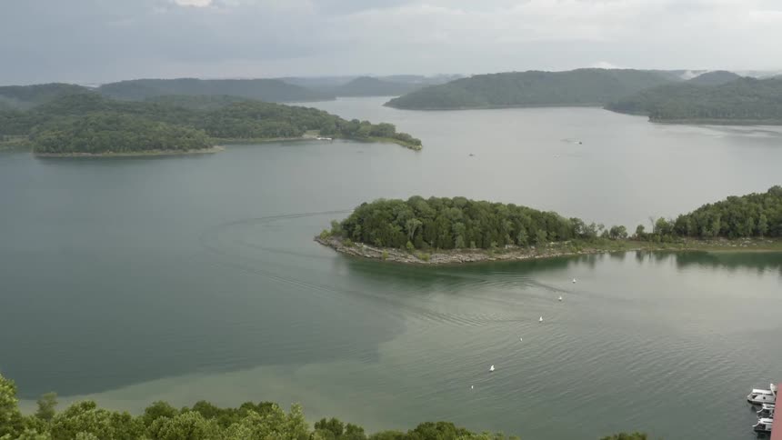 The water is covered by foggy island