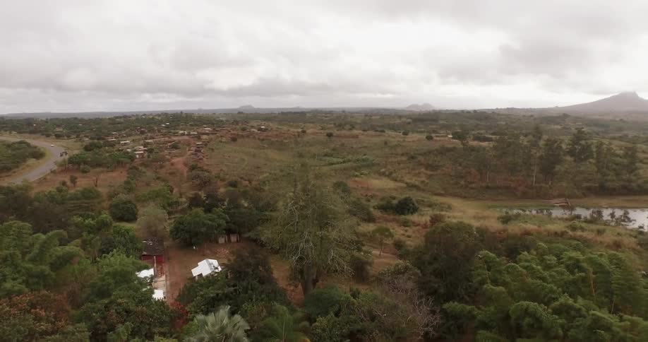 An aerial view of a rural area on a cloudy day