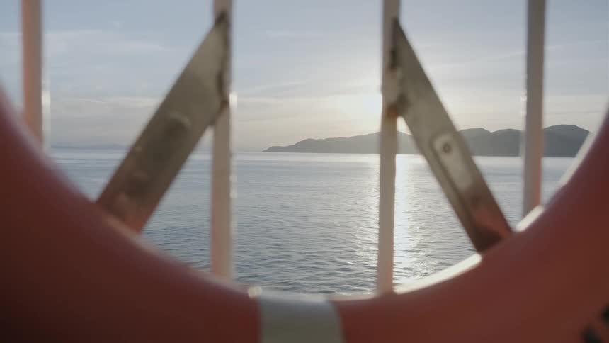 Water floats past the life preserver