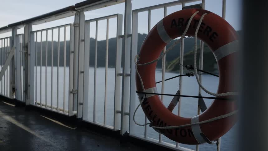 A life preserver is tied to a ship rail