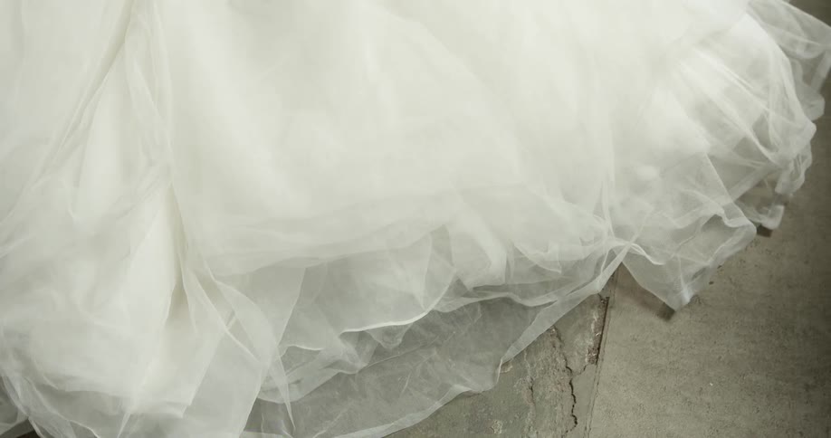 Train of a white wedding dress