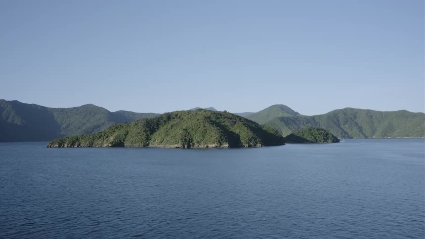 The islands are covered with hills and green