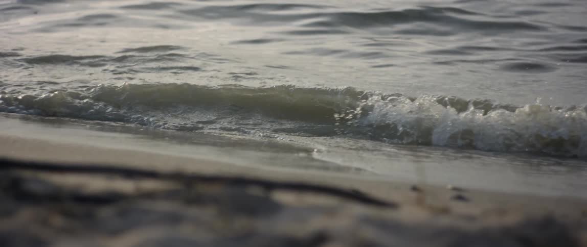 Waves roll in to the beach