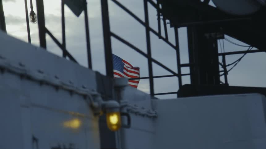 An american flag waves in the breeze