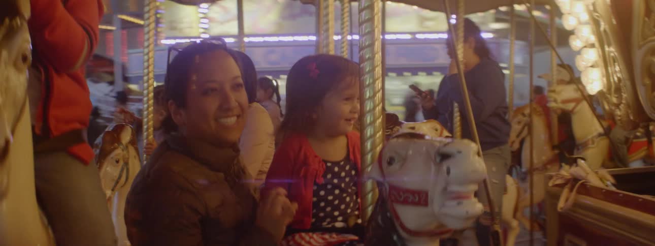 The merry go round is full of people