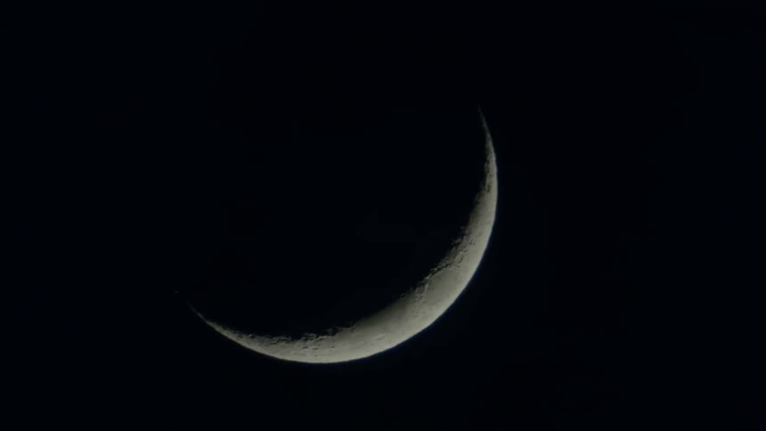 The waning crescent moon is moving through the night sky