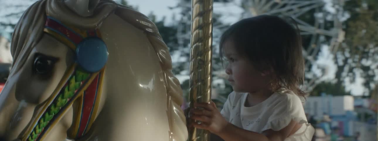 The merry go round moves people around in a circle