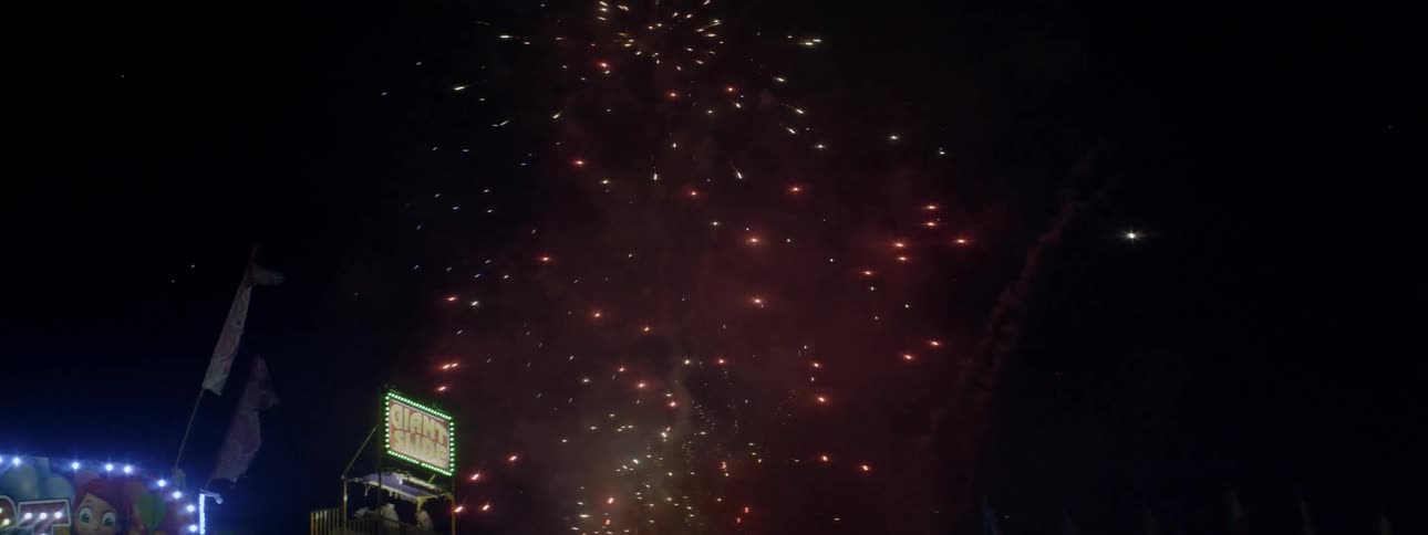 The fireworks fill the night sky