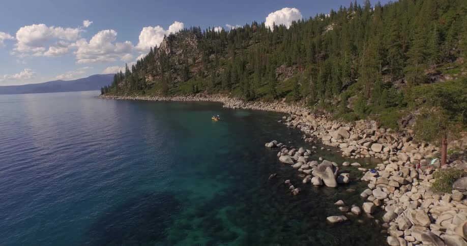 Large body of water with a rocky shoreline
