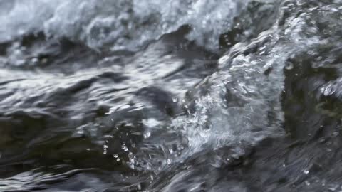 Water flowing fast and turbulent