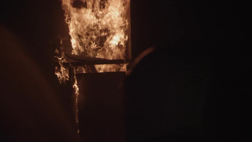 Firefighters In Burning House