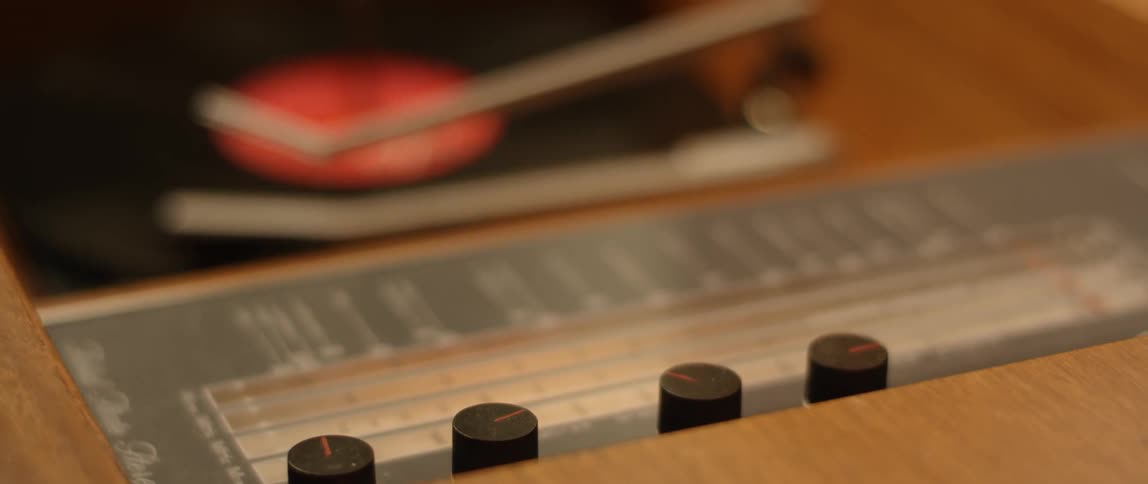 An album spins on a record player