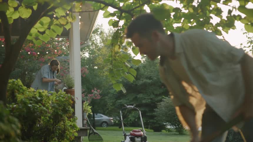 The two people work on the yard together