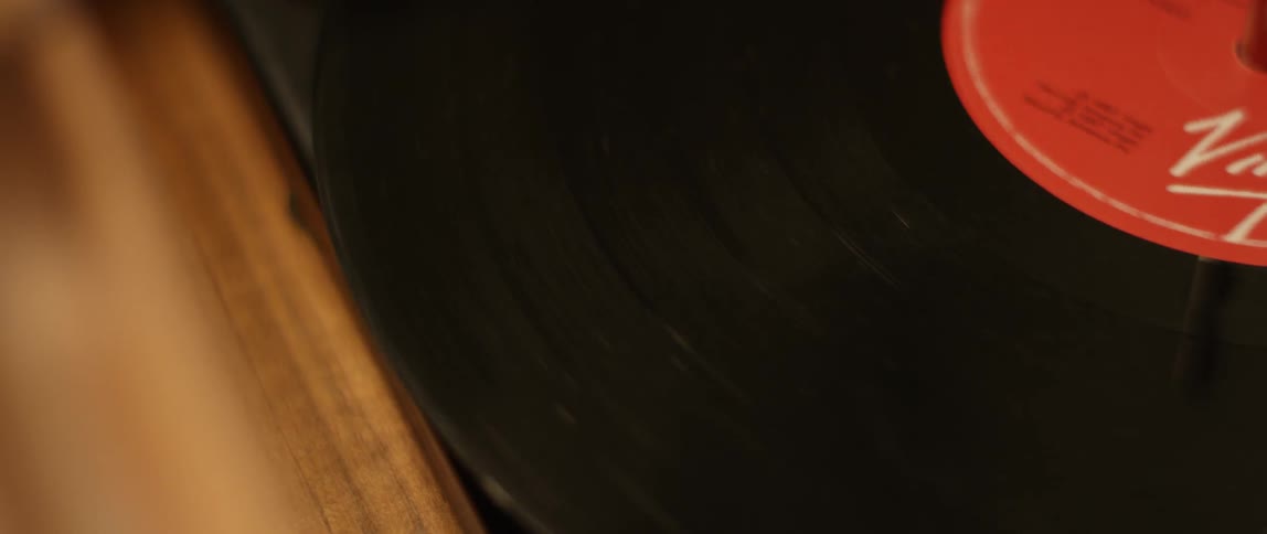 An album spins on a record player