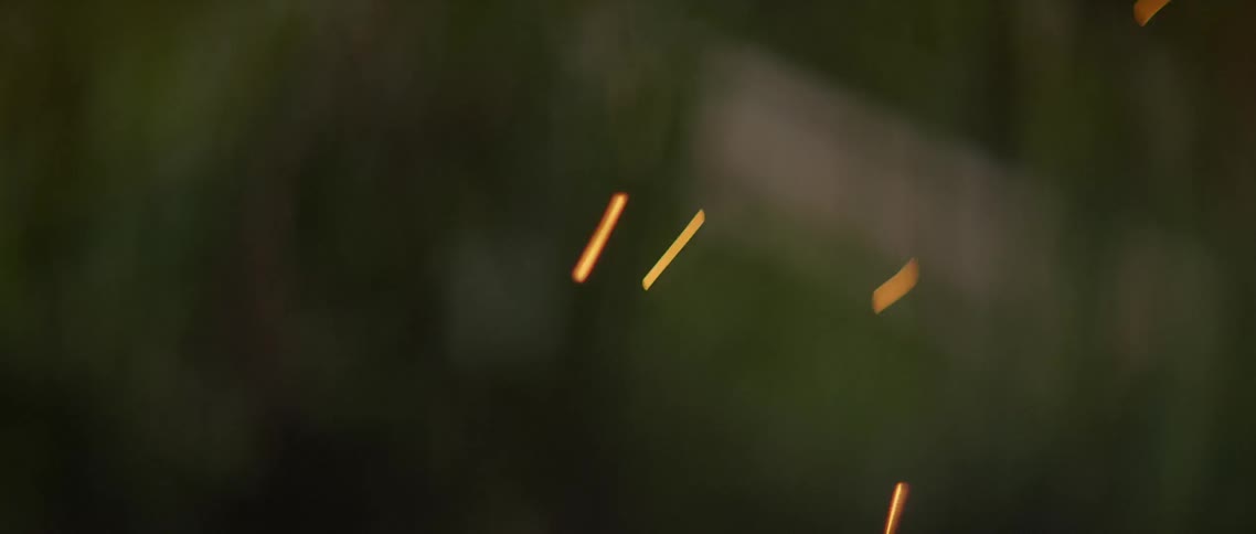 Sparks fly from a fire