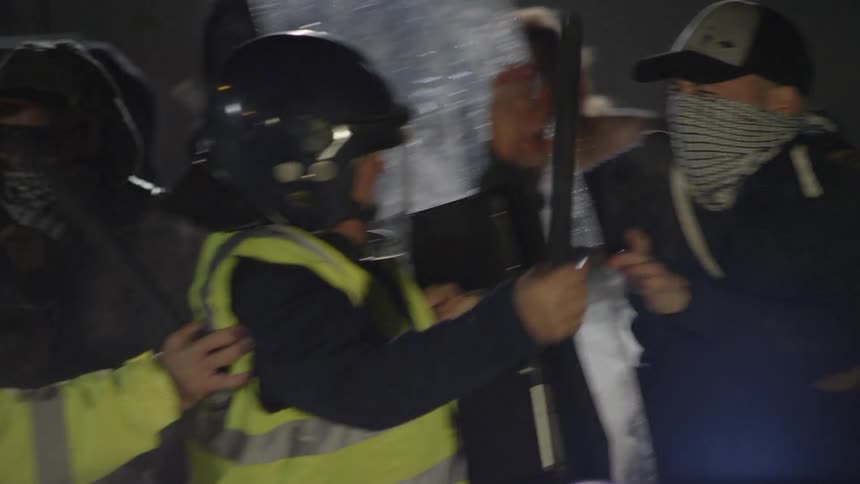 Police and protestors clashing