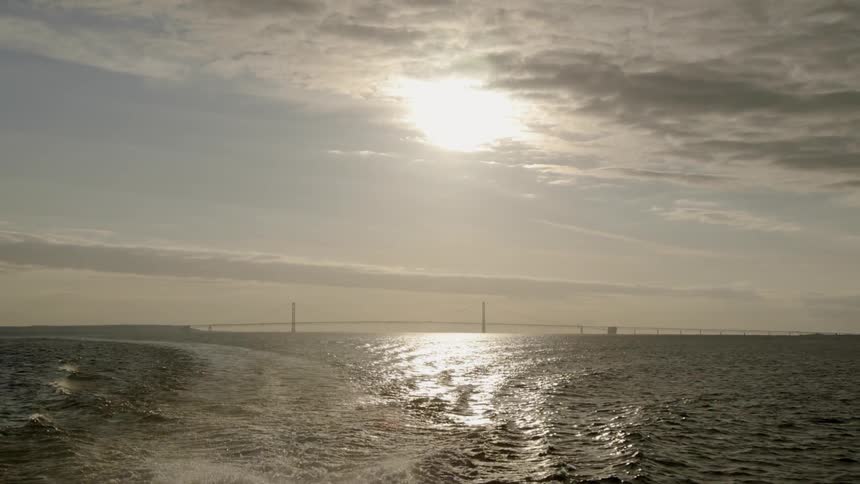The bridge is past the rough waters