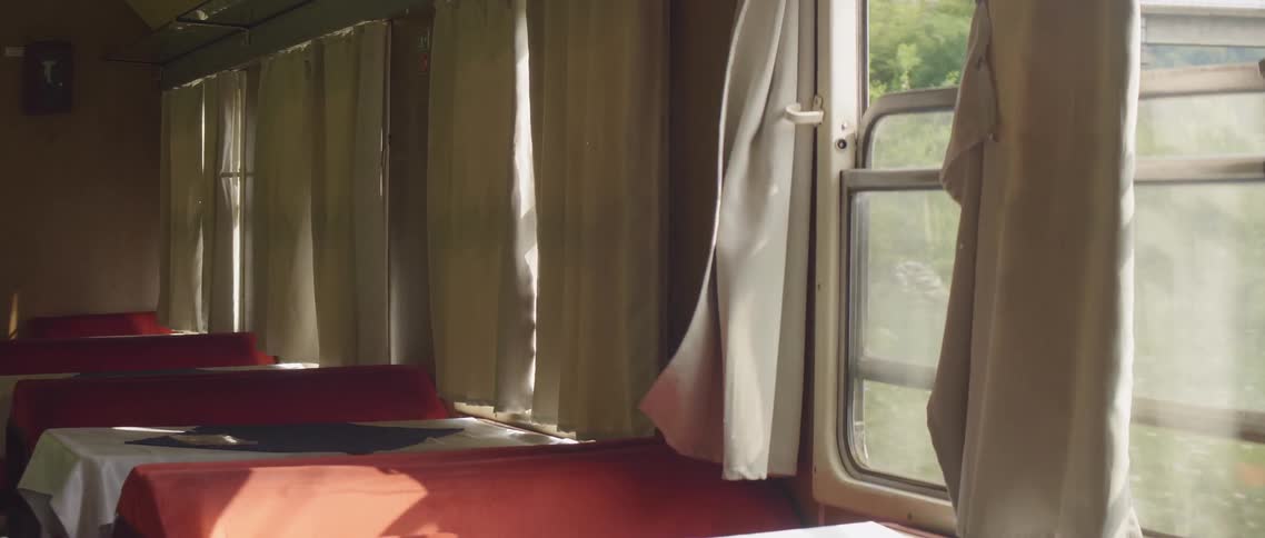 The train is empty on a sunny day