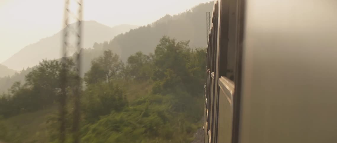 The train is making a turn through the tunnel