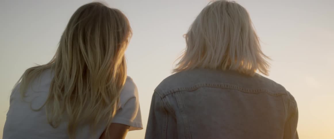 The two women talk and point things out