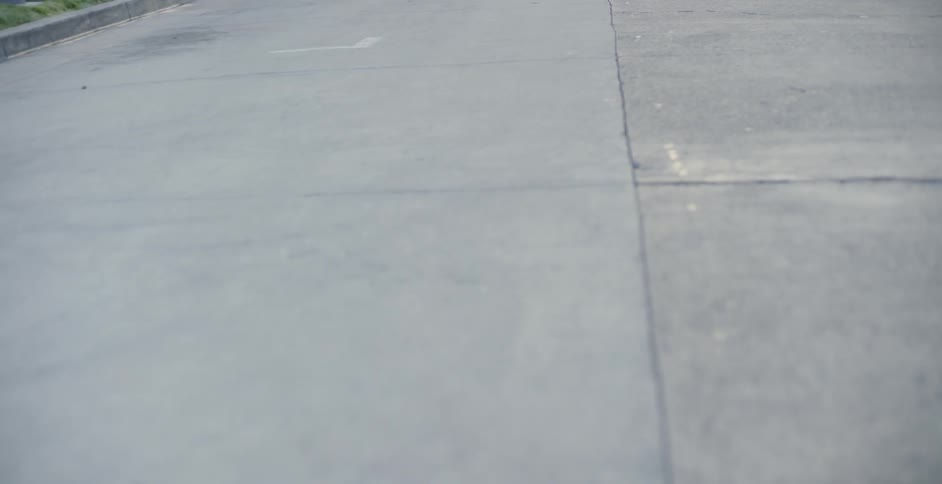 Cracks in the pavement in an outdoor area