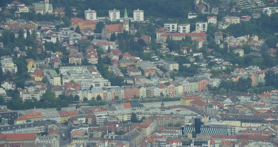 Trees and buildings are cluttered in town