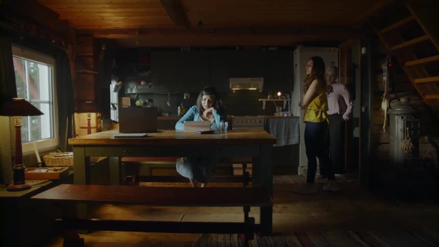 The women walk over to the table together