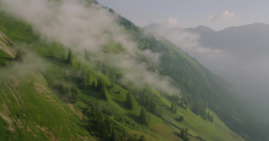 The fog is rolling down the green hills