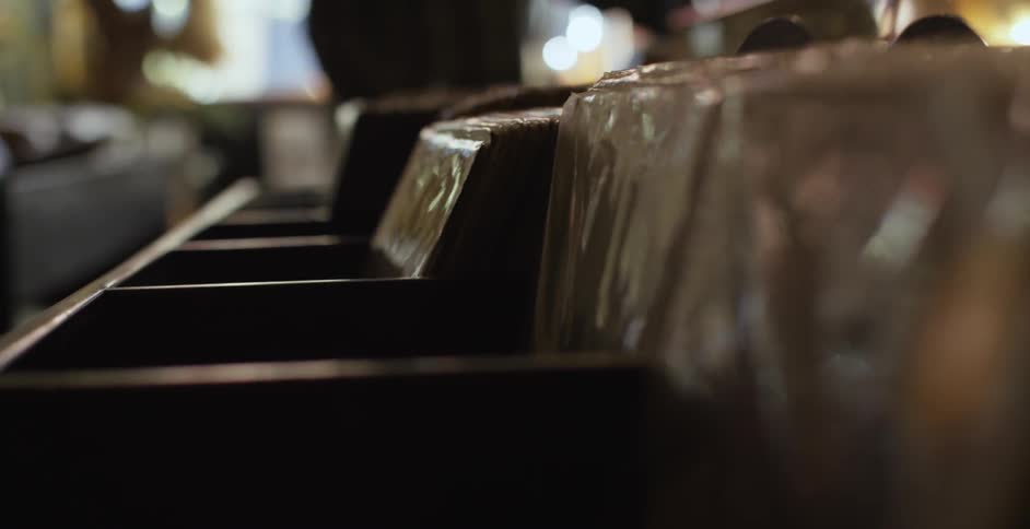 Closeup shot of vinyl records in their jackets in a record shop