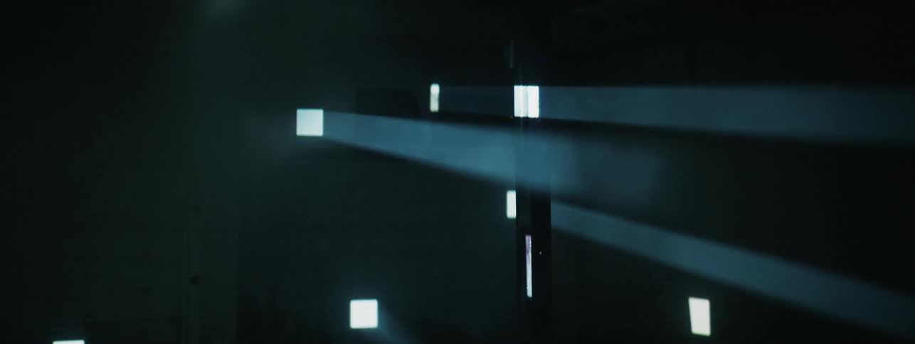 The lights shine and blink in squares throughout the room