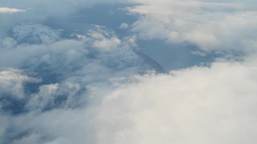 Clouds hover low over mountains