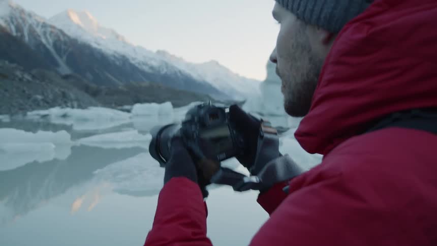 Man photographs mountains and ice floes