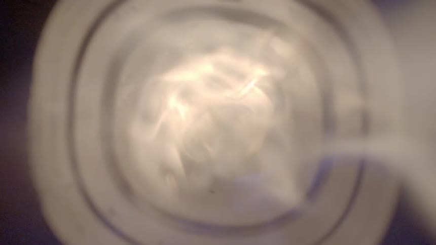 Smoke comes through a cylinder