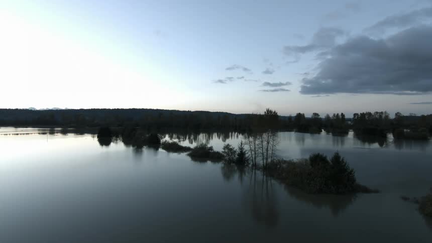 A lake is divided by marshes