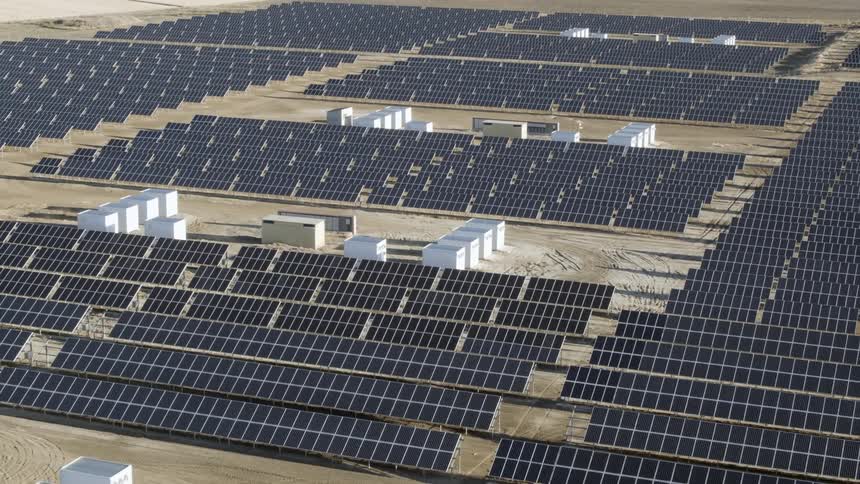 A field is filled with solar panels