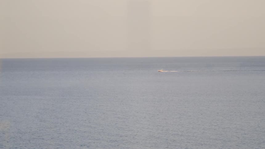 A boat travels on the water