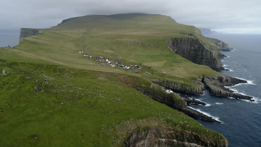 A small village on a mountain in the sea