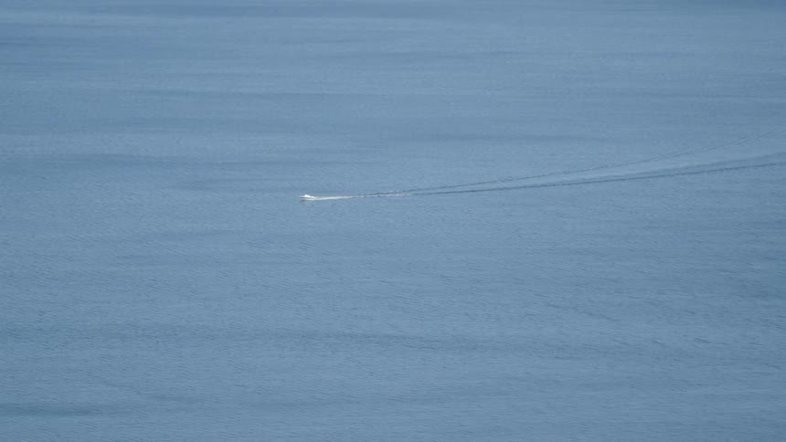 Boat navigating on a calm sea