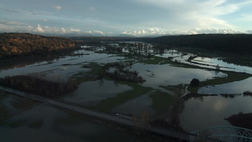 A lake is divided by marshes