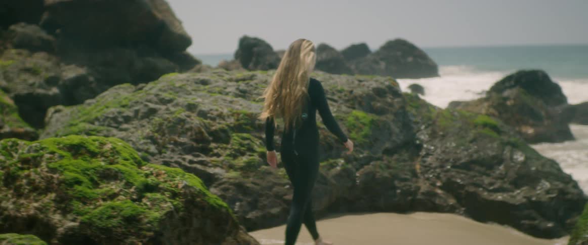 Young Woman Meditating And Surfing
