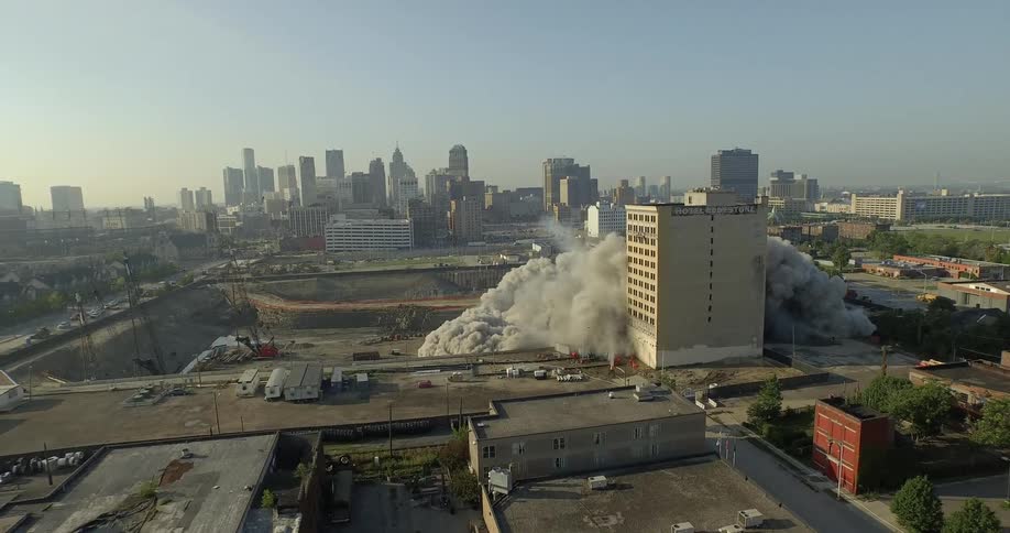 An aerial footage of building demolish process