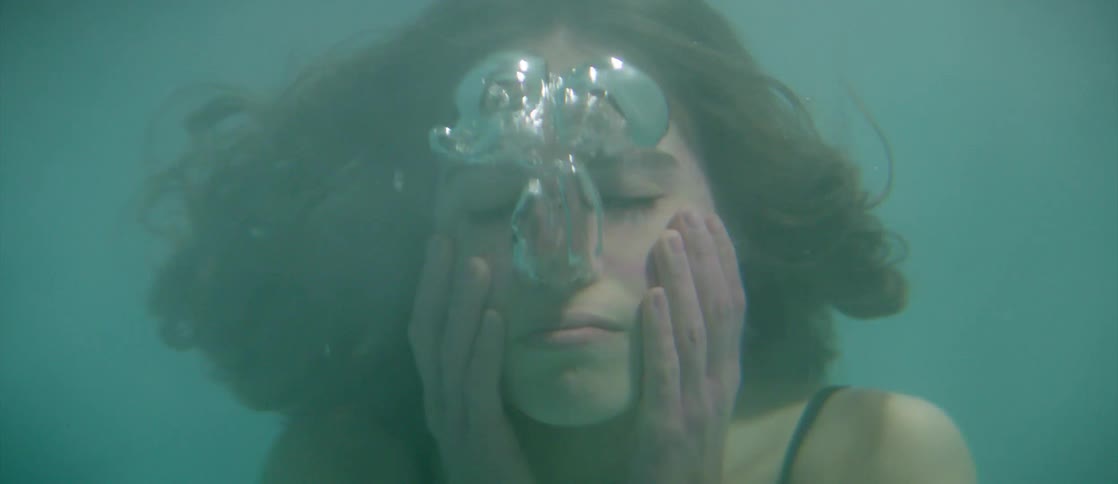 A woman is underwater